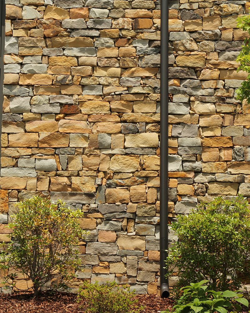 Blue Grey and Earthtone Medium Stack Sandstone Blend laid in a Dry Stack Pattern