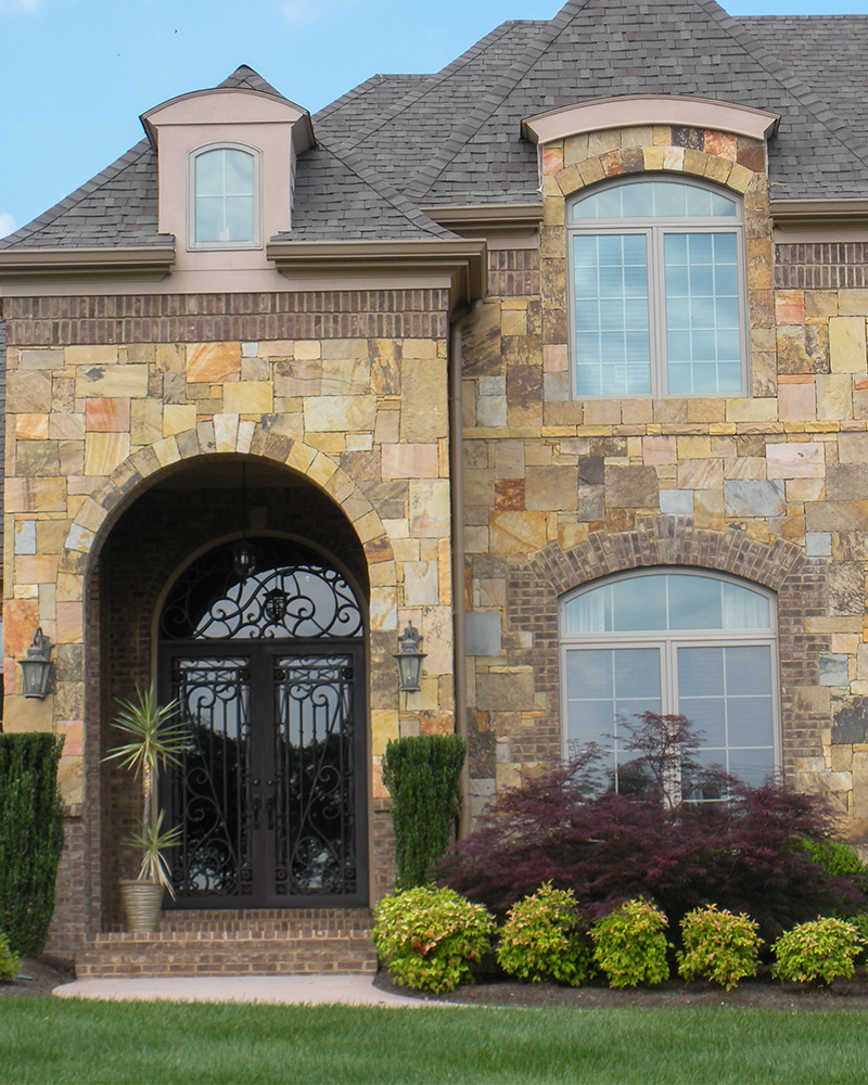 Earthtone Squared Random Sandstone Sawn Edge Ashlar Laid in a But Jointed Pattern